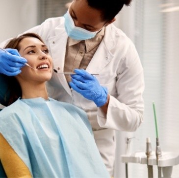 Humana dentist in Waco performing a dental exam