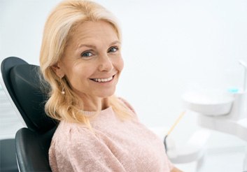 Woman smiling in the dental chair