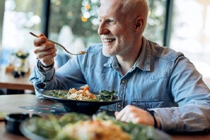 a man enjoying a healthy meal