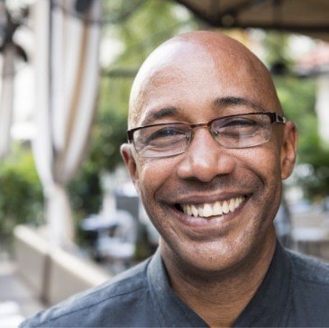 Close up of smiling man with glasses