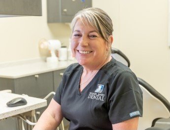 smiling staff member in Waco