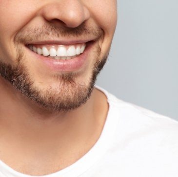 Close up of man with short beard smiling