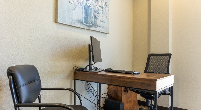 Desk with computer inside of dental office