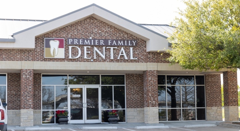 Front of Premier Family Dental building from parking lot