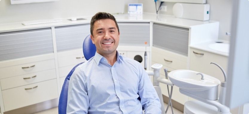 Dental patient smiling during preventive dentistry visit