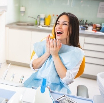 Woman laughing in dental chair