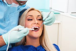 blonde woman, woman smiling, dental visit, cosmetic dentistry 