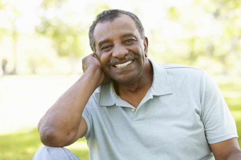 an older man smiling 