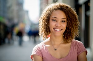 Portrait of a happy woman living in the city